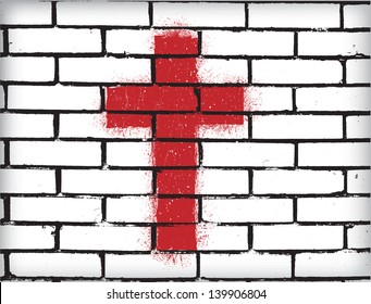 Grunge cross on the brick wall