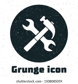 Grunge Crossed hammer and wrench icon isolated on white background. Hardware tools.  Vector Illustration