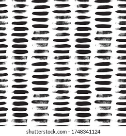 Grunge dash lines vector seamless pattern. Horizontal brush strokes, straight stripes or lines. Black ink striped hand drawn background. Geometric ornament for wrapping paper. Dry brushstrokes pattern