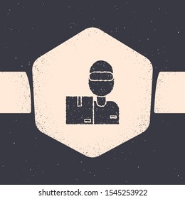 Grunge Delivery man with cardboard boxes icon isolated on grey background. Door to door delivery by courier. Monochrome vintage drawing. Vector Illustration