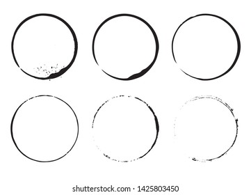 Grunge design element ink circles. Set of cofee ring stains. Black round frames on a white background.