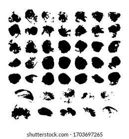 Elementos de diseño gruesos, manchas negras aisladas en un fondo blanco. Un conjunto de puntos de tinta.