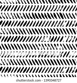 Grunge diagonal lines ink seamless pattern. Black hand drawn brush texture. Short paint dry brushstrokes. Tire tracks, geometric pattern. Abstract background design. Wallpaper vector fill.