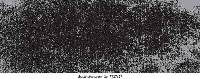 Grunge distressed texture with rough black speckles and scratches on gray background. Ideal for vintage, punk, urban, or gritty design projects