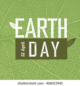 Grunge Earth Day Logo on green leaf veins texture.  "Earth day, 22 April".