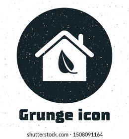 Grunge Eco friendly house icon isolated on white background. Eco house with leaf.  Vector Illustration