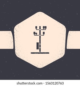 Grunge Electric tower used to support an overhead power line icon isolated on grey background. High voltage power pole line. Monochrome vintage drawing. Vector Illustration