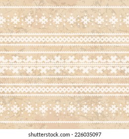 grunge ethnic tribal white pattern of triangles on the old paper background