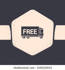 Grunge Free delivery service icon isolated on grey background. Free shipping. 24 hour and fast delivery. Monochrome vintage drawing. Vector Illustration
