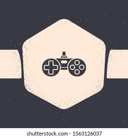Grunge Gamepad icon isolated on grey background. Game controller. Monochrome vintage drawing. Vector Illustration