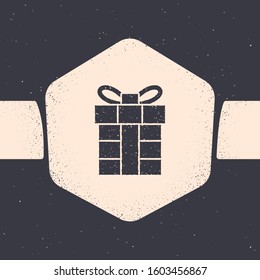 Grunge Gift box icon isolated on grey background. Merry Christmas and Happy New Year. Monochrome vintage drawing. Vector Illustration