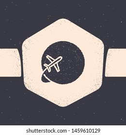 Grunge Globe with flying plane icon isolated on grey background. Airplane fly around the planet earth. Aircraft world icon. Monochrome vintage drawing. Vector Illustration
