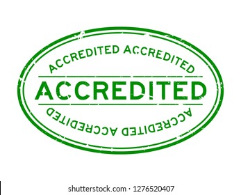 Grunge green accredited word oval rubber seal stamp on white background