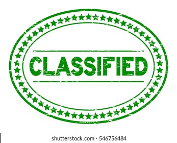 Grunge green classified oval rubber stamp on white background