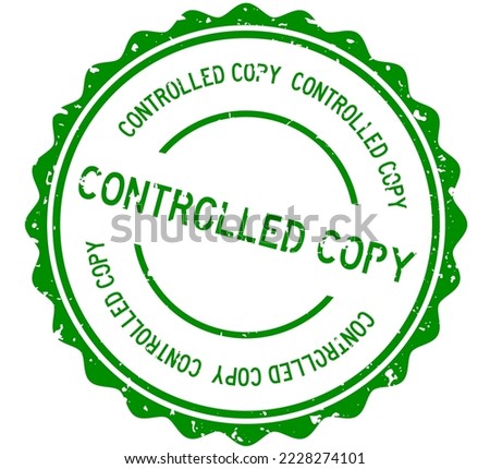 Grunge green controlled copy word round rubber seal stamp on white background