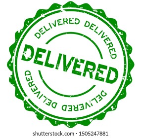Grunge green delivered word round rubber seal stamp on white background