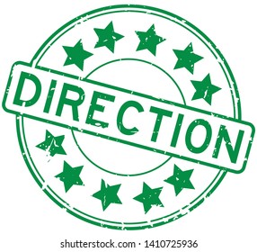 Grunge green direction with star icon round rubber seal stamp on white background