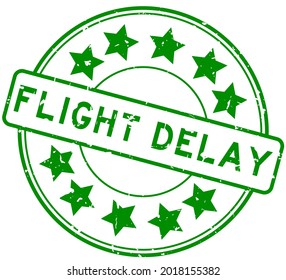 Grunge green flight delay word with star icon round rubber seal stamp on white background
