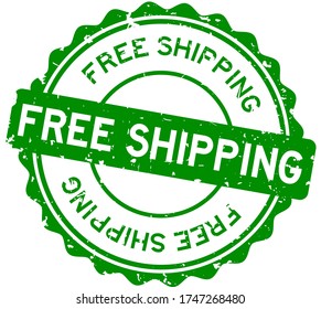 Grunge green free shipping word round rubber seal stamp on white background