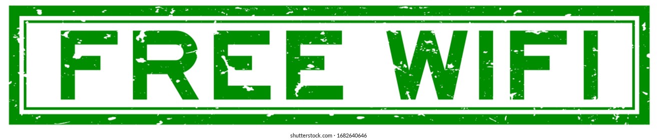 Grunge green free wifi word rubber seal stamp on white background