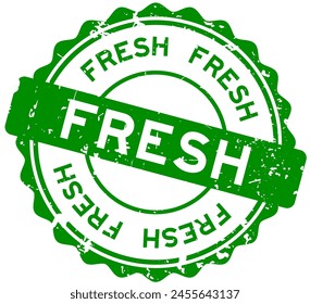 Grunge green fresh word round rubber seal stamp on white background