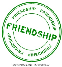 Grunge green friendship word round rubber seal stamp on white background