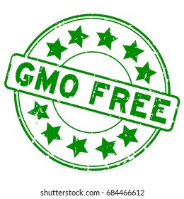 Grunge green GMO free with star icon round rubber stamp on white background