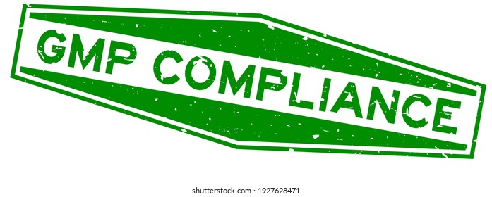 Grunge green GMP (Abbreviation good manufacturing practice) compliance word hexagon rubber seal stamp on white background