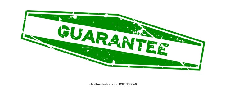 Grunge green guarantee hexagon rubber seal stamp on white background