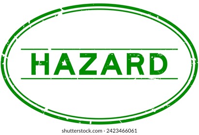 Grunge green hazard word oval rubber seal stamp on white background