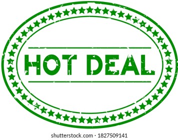 Grunge green hot deal word oval rubber seal stamp on white background
