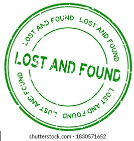 Grunge green lost and found word round rubber seal stamp on white background