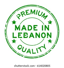 Grunge green premium quality made in Lebanon round rubber seal stamp on white background