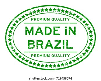 Grunge green premium quality made in Brazil oval rubber seal stamp on white background 