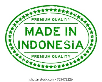 Grunge green premium quality made in Indonesia oval rubber seal stamp on white background