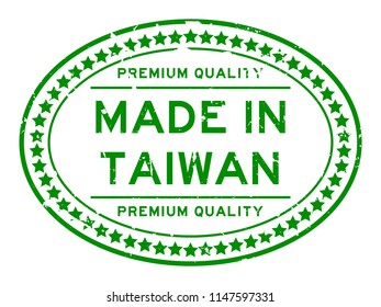 Grunge green premiumq quality made in Taiwan oval rubber seal business stamp on white background