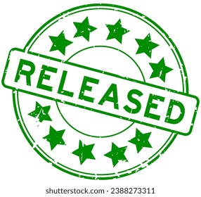 Grunge green released word with star icon round rubber seal stamp on white background
