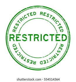 Grunge green restricted round rubber stamp on white background