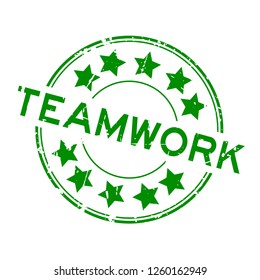 Grunge green teamwork word round rubber seal stamp on white background