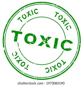 Grunge green toxic word round rubber seal stamp on white background