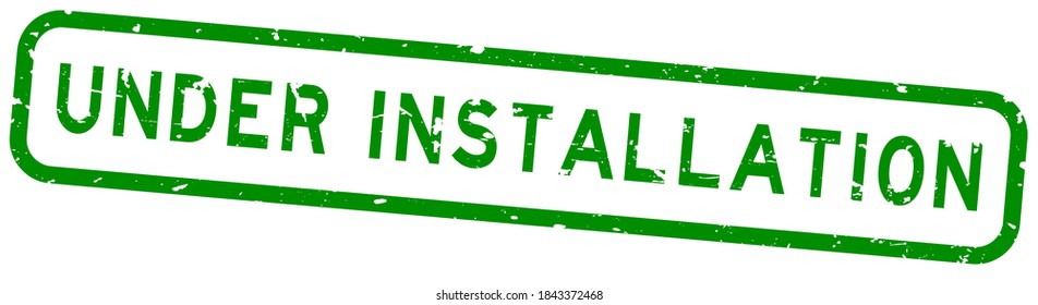 Grunge green under installation word square rubber seal stamp on white background
