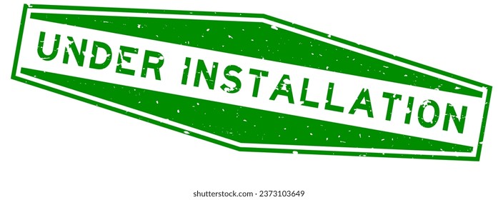 Grunge green under installation word hexagon rubber seal stamp on white background