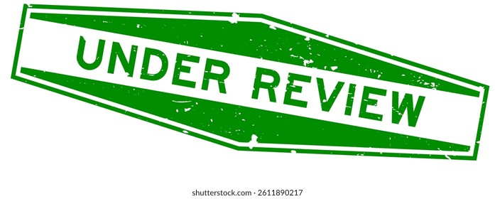 Grunge green under review word hexagon rubber seal stamp on white background