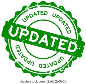 Grunge green updated word round rubber seal stamp on white background