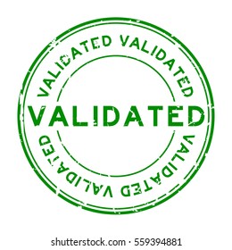 Grunge green validate round rubber stamp on white background