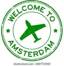 Grunge green welcome to amsterdam with airplane icon round rubber seal stamp on white background
