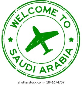 Grunge Green Welcome To Saudi Arabia Word With Airplane Icon Round Rubber Seal Stamp On White Background