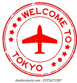 Grunge green welcome to tokyo word with plane icon round rubber seal stamp on white background
