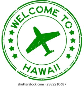 Grunge green welcome to word hawaii with plane icon round rubber seal stamp on white background