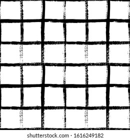 Grunge grid seamless pattern. Abstract plaid texture hand drawn with a ink brush strokes. Vector Monochrome Scandinavian background in a simple style for print on textiles, paper, Wallpaper, t-shirts